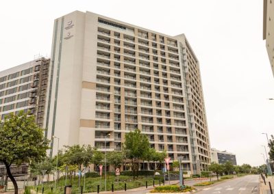 High-rise exterior view of Menlyn Maine apartment building