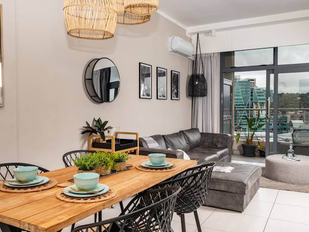 Stylish furnished living area inside The Capital Trilogy apartment