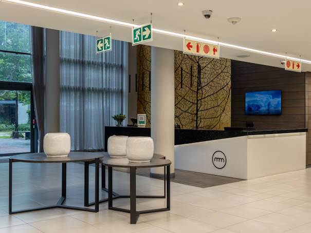 Modern check-in reception area at The Capital Trilogy Menlyn Maine